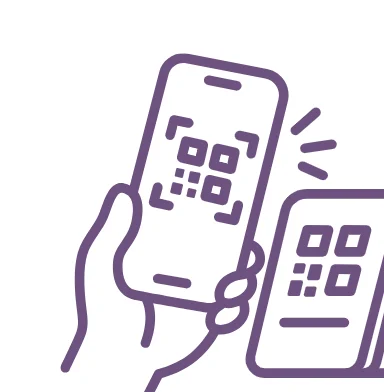 A hand holding a phone that shows a QR code.